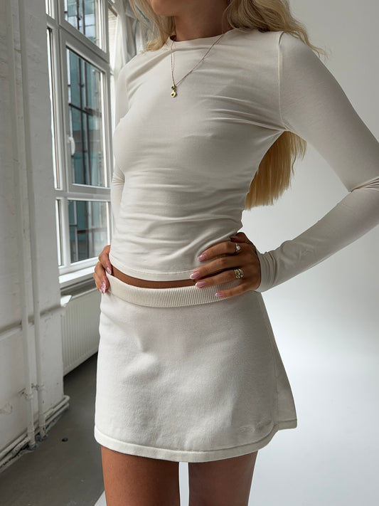 light knit mini skirt oat milk