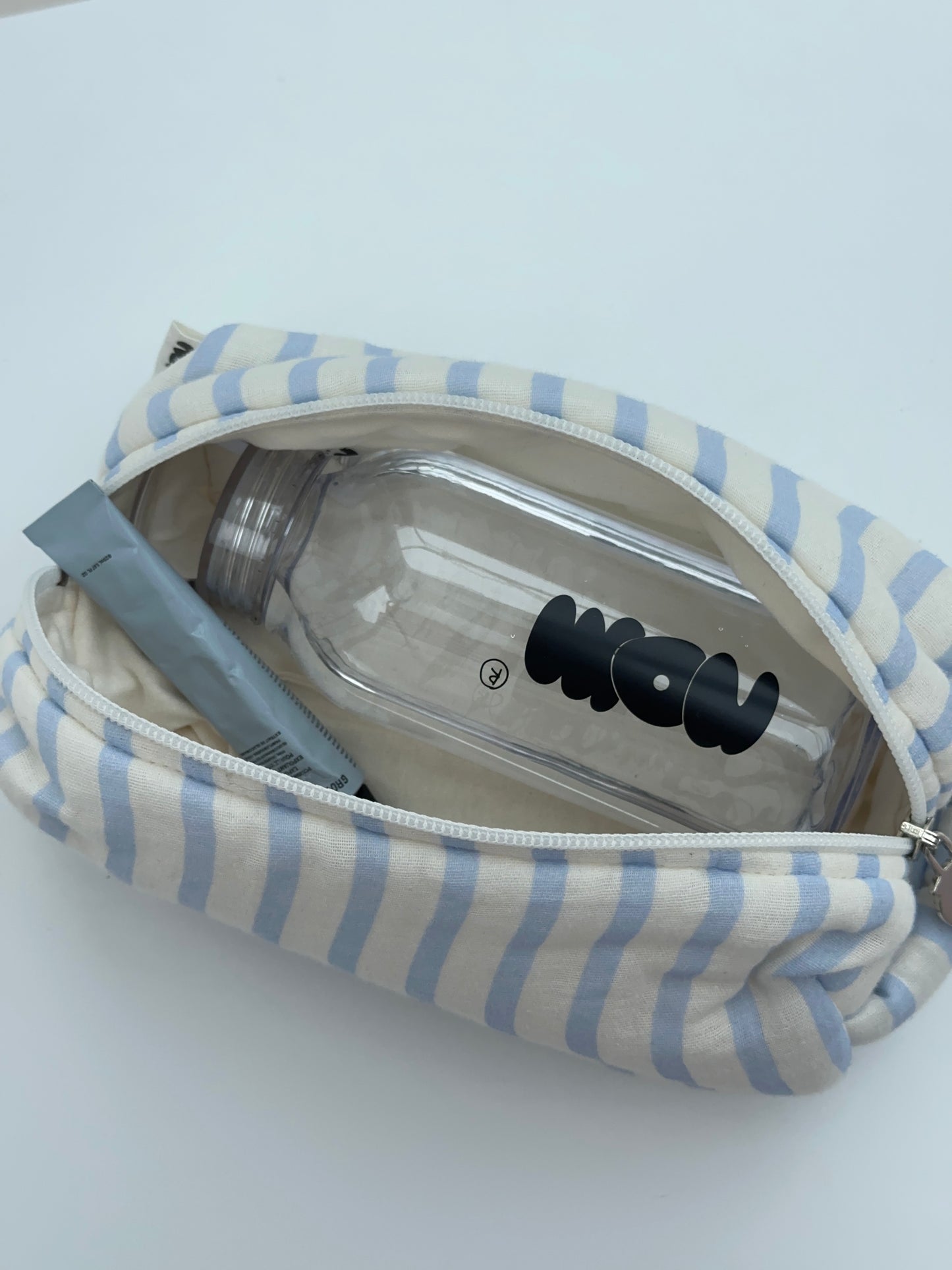 cosmetic bag cream blue stripes